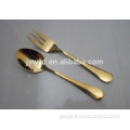 gold dessert spoon and fork